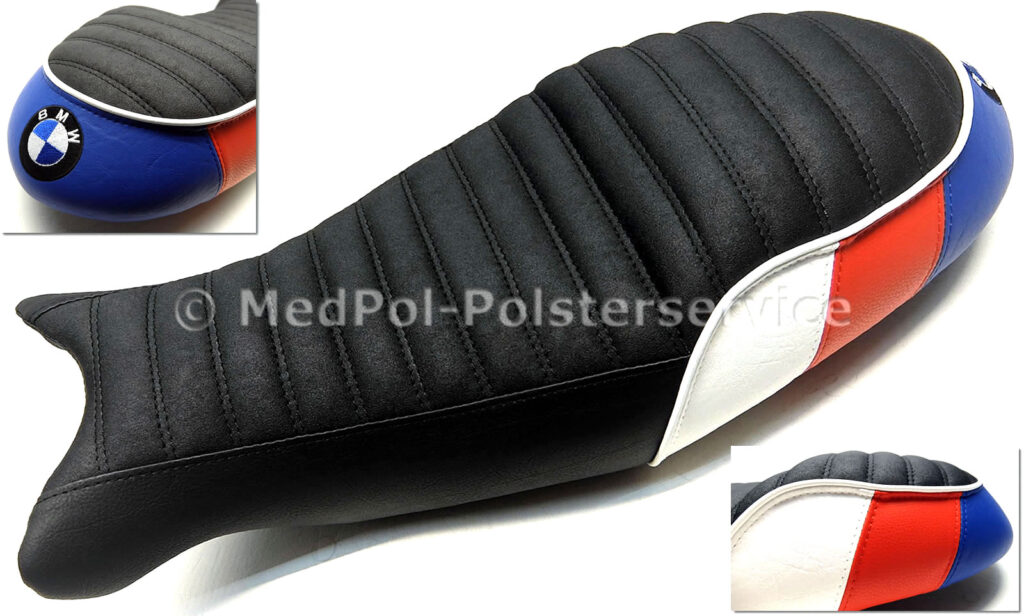 Urban G/S Umarbeitung Nubuck/Matt, Weiß, Orangerot und Blau, Komfort-Aktivmatte, Fahrer zusätzliche Aufpolsterung um 2cm, Soziussitz um 4cm, Lendenstütze um 2cm erhöht, Quersteppung mit doppelter Ziernaht Schwarz, alle anderen Nähte der Farbe angepasst. Mehrfarbige Stickerei und Keder in Weiß.