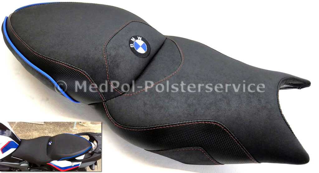 K 1300 S Neubezug in Nubuck und Carbon, Ziernähte in Rot, Keder-Blau und eine mehrfarbige Stickerei. Mit einer an den Körper angepassten Komfortpolsterung incl. Gel-Aktivmatte.