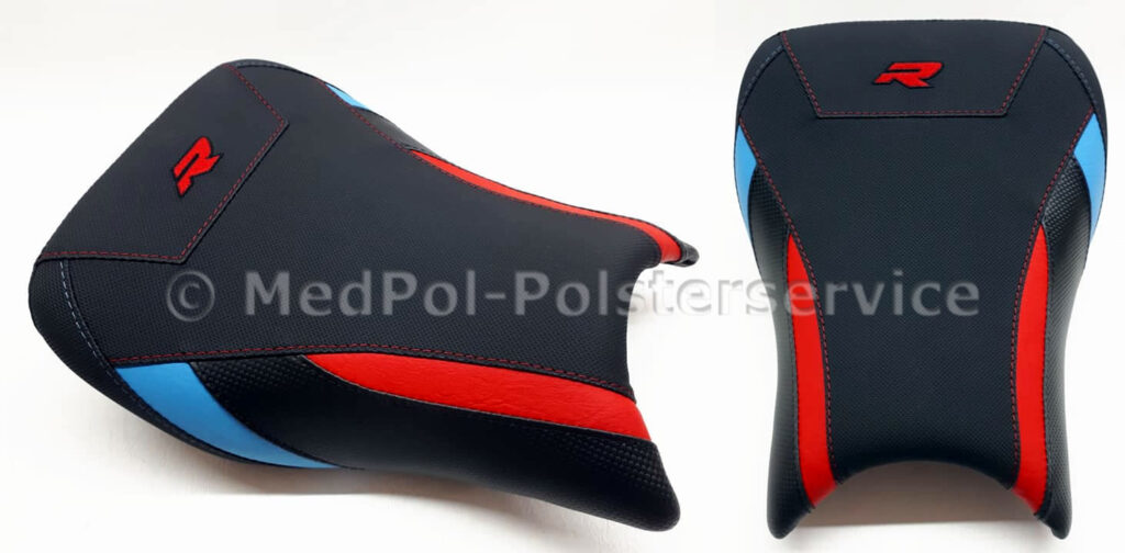 S 1000 R Fahrersitz komplett Neubezug in Antirutsch, Carbon, Power-Rot und Hellblau, Ziernähte in Rot und Hellblau, Stickerei in Rot. An den Fahrer angepasste Komfortpolsterung incl. Gel-Aktivmatte